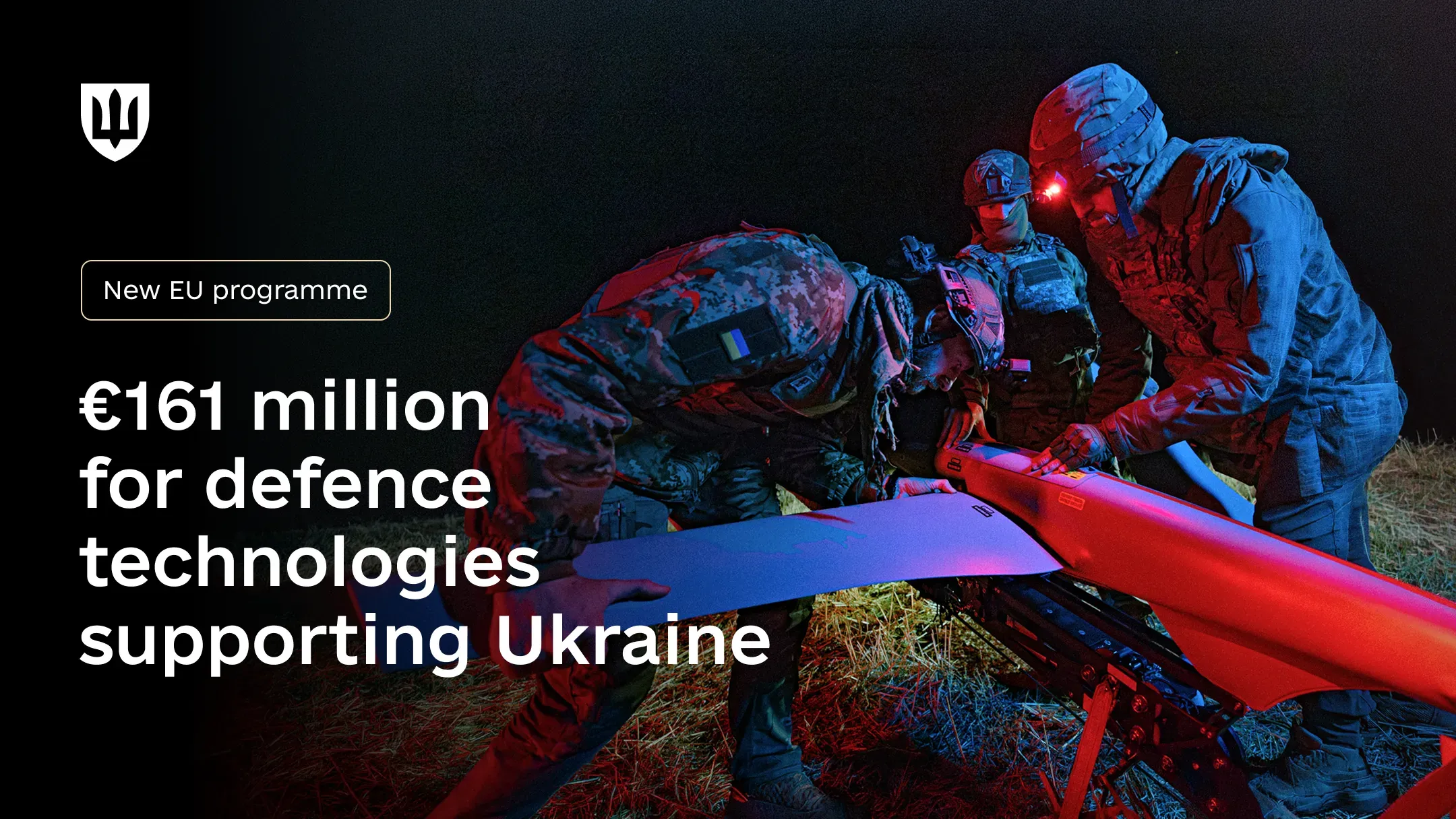 Three service members in combat gear operate a drone, with on-screen text highlighting a new €161 million EU programme for Ukraine’s defence technologies.