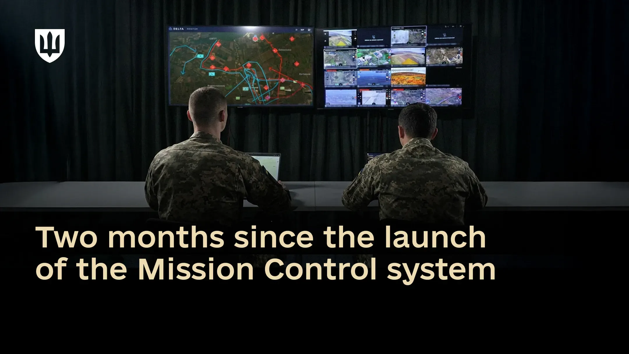 Ukrainian service members are monitoring multiple screens displaying Mission Control within the DELTA ecosystem for unmanned systems operations