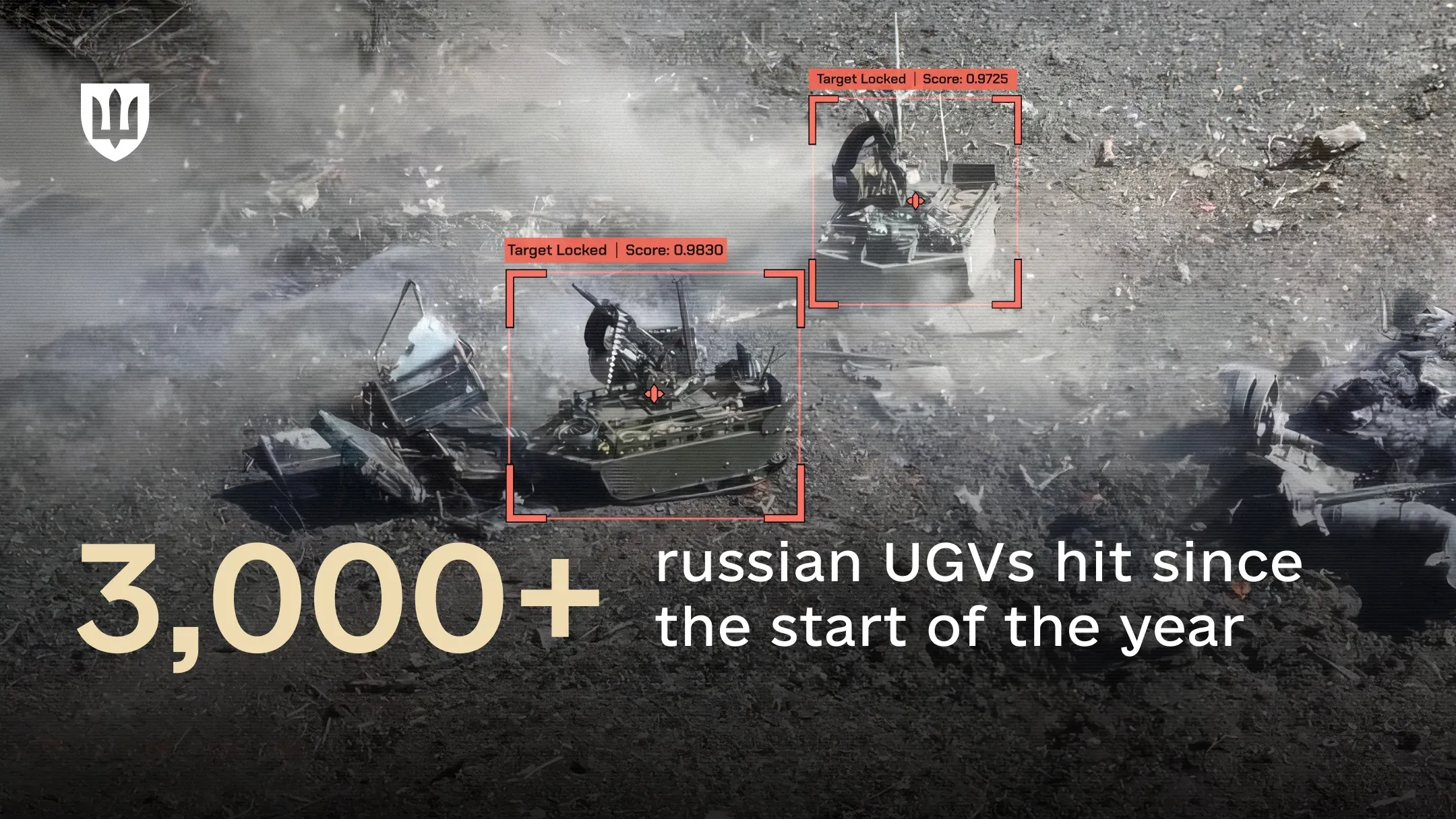 Drone-camera image showing two unmanned ground vehicles amid debris, each framed by a red target-lock box