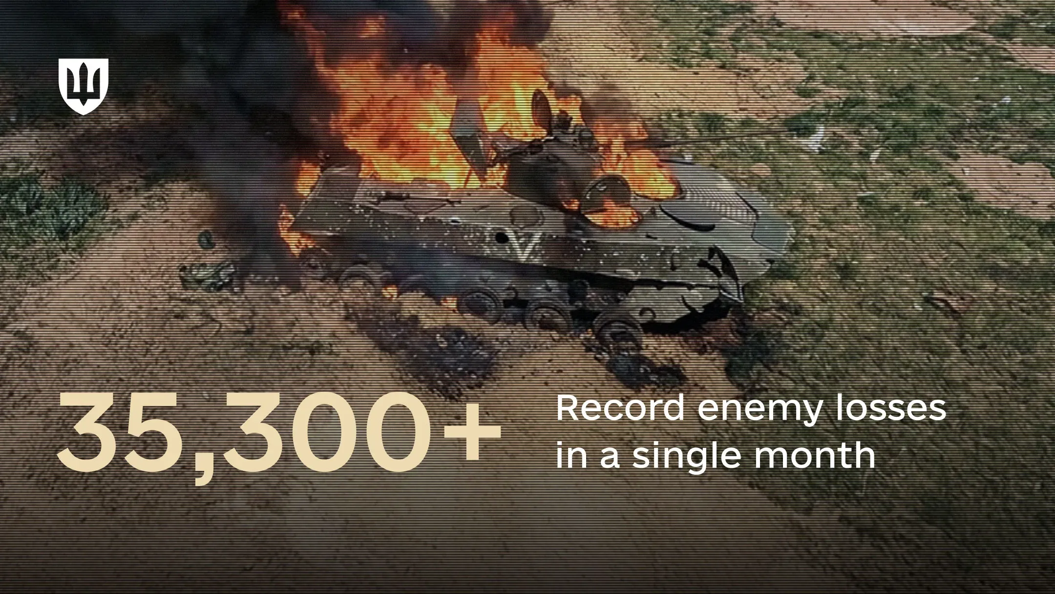 Destroyed enemy armored vehicle with on-screen text indicating record enemy losses of over 35,000 personnel in a single month