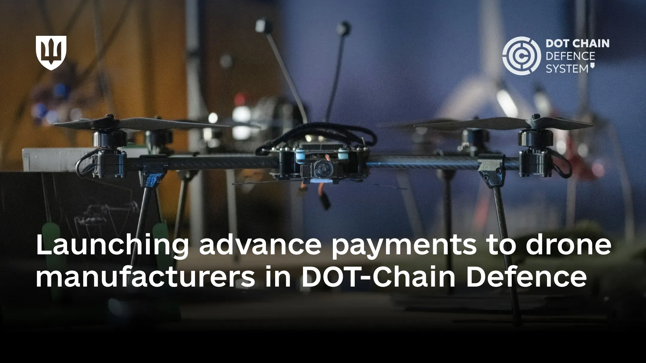 Combat quadcopter with an open frame, front-facing camera, and communication antennas, symbolizing the launch of an advance payment program for drone manufacturers through the DOT-Chain system