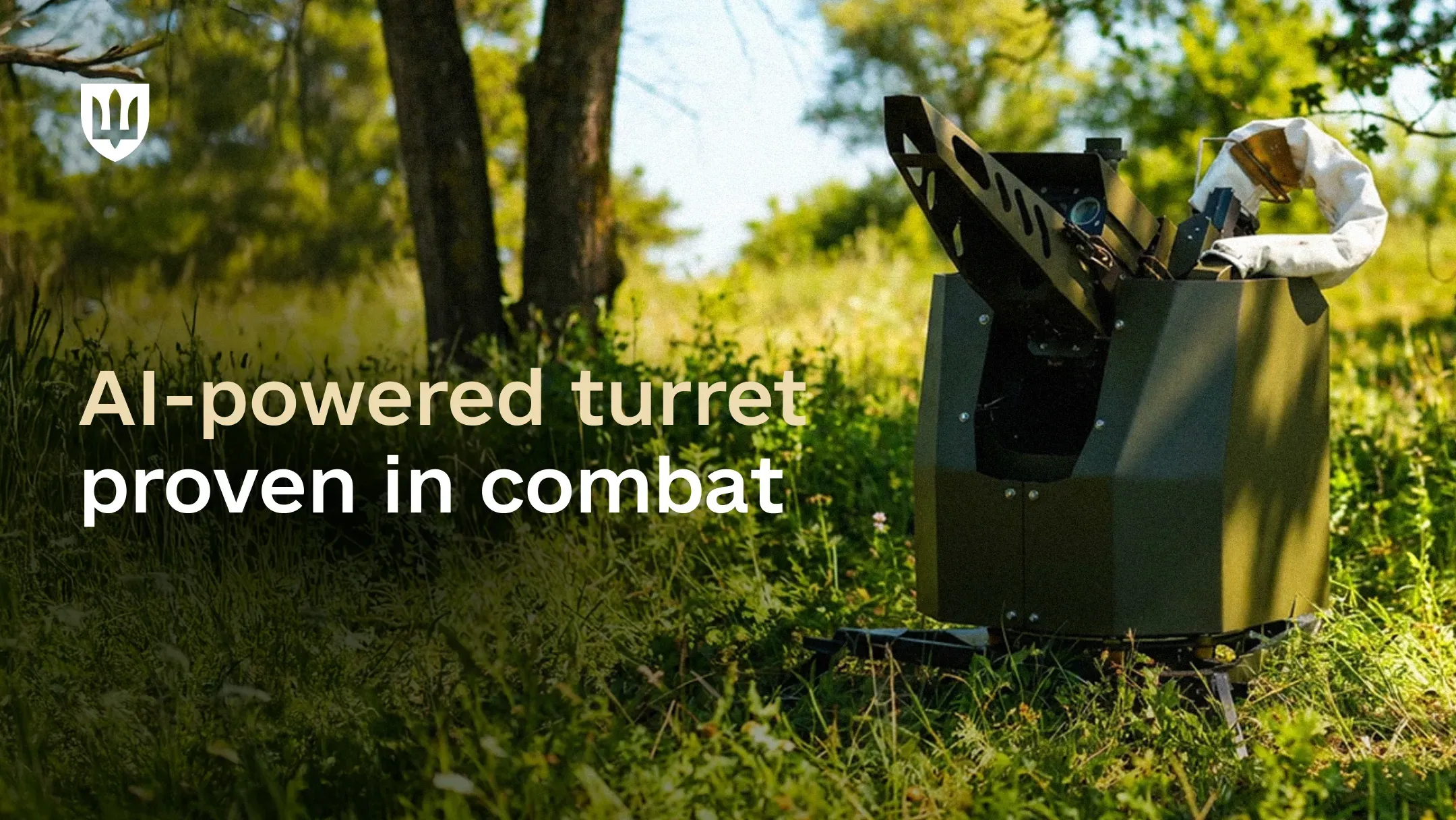 An olive-colored AI-powered turret positioned on a grassy clearing among trees