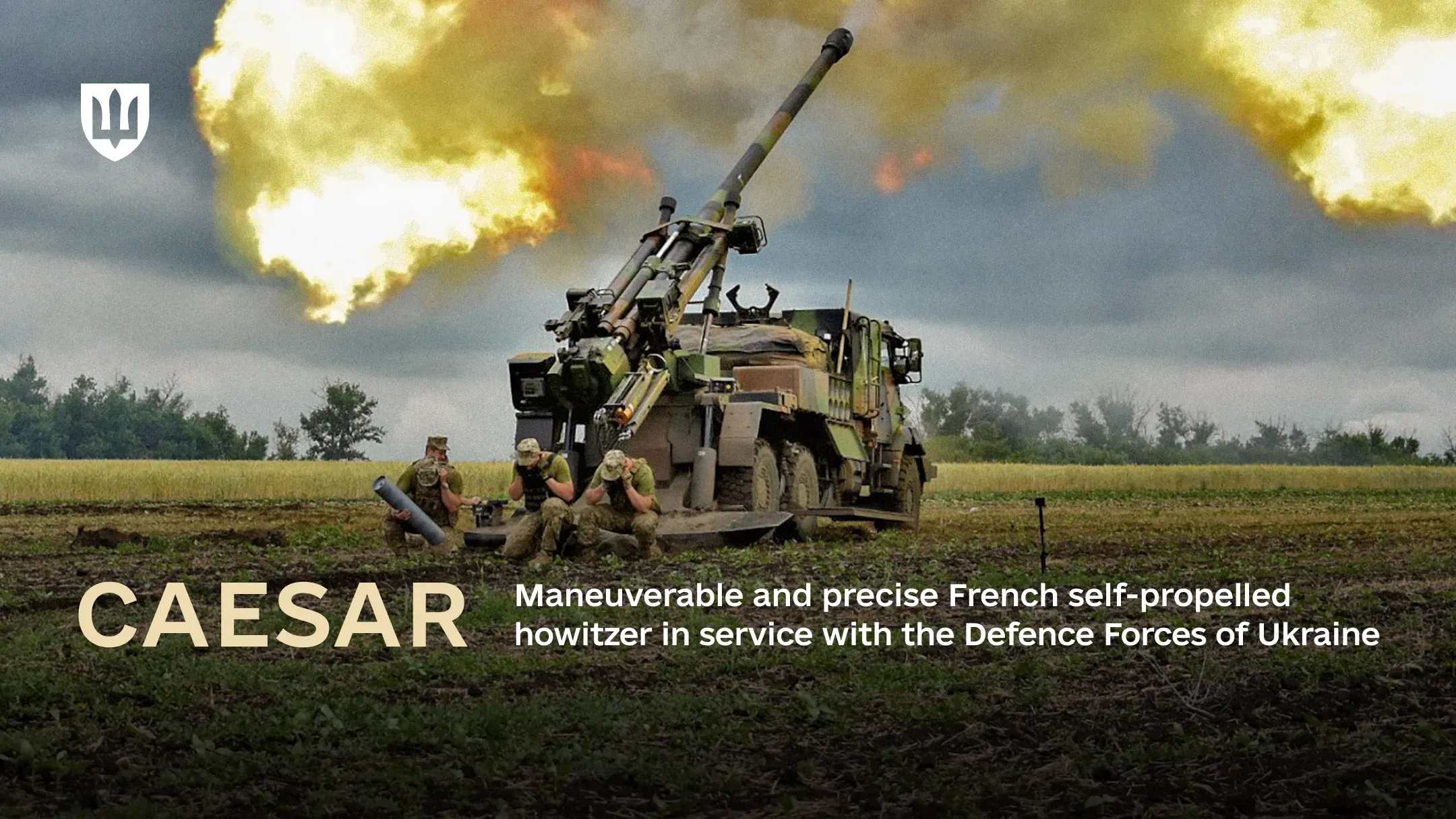 The CAESAR self-propelled howitzer firing in combat, with Ukrainian service members nearby covering their ears from the powerful blast