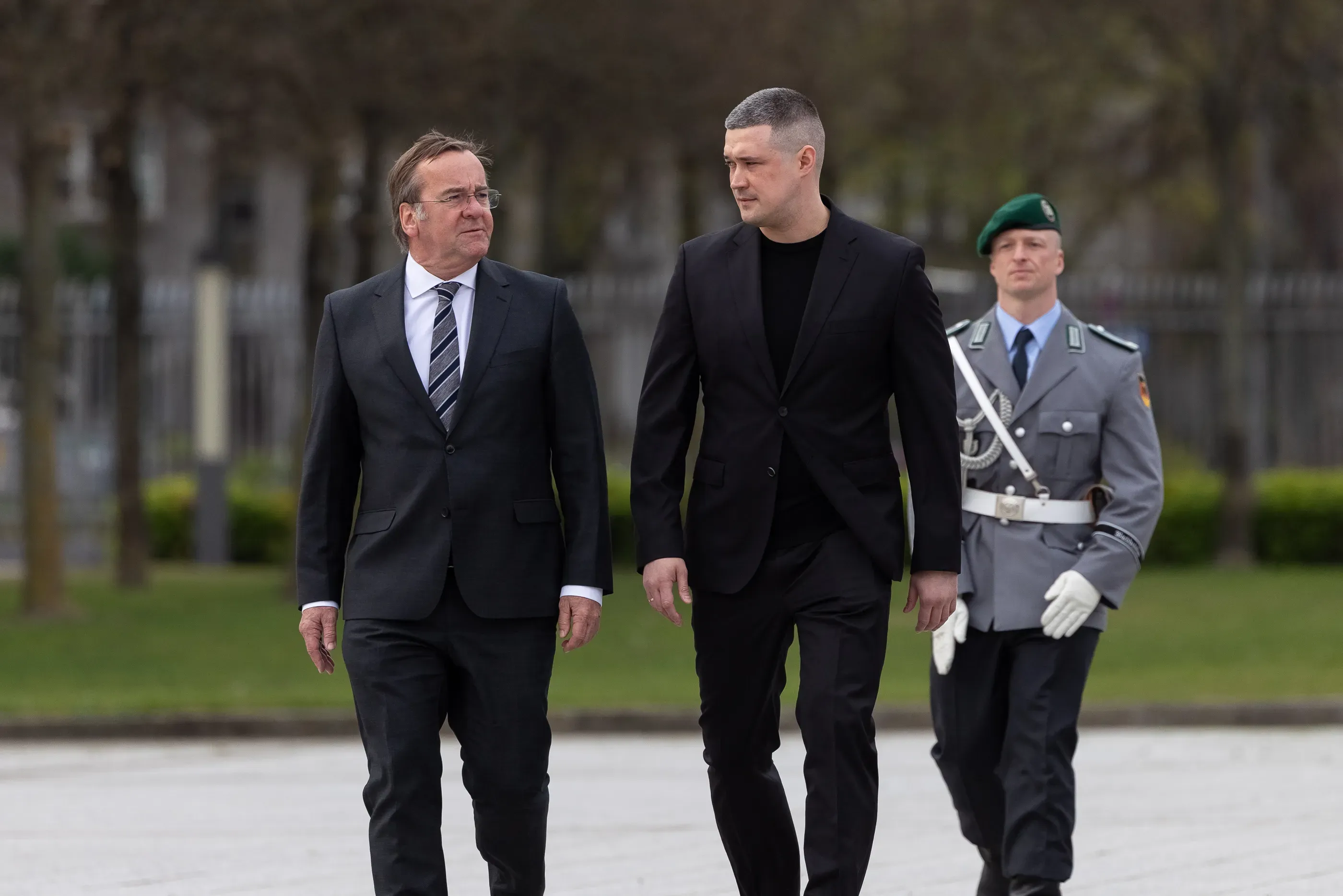 Boris Pistorius and Mykhailo Fedorov walk side by side during a meeting in Germany