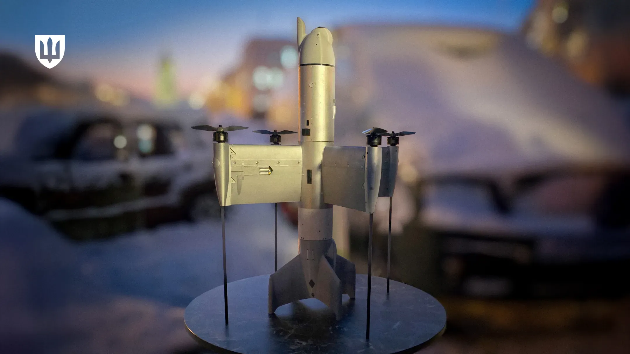 The Octopus drone is displayed on a round table in an outdoor setting