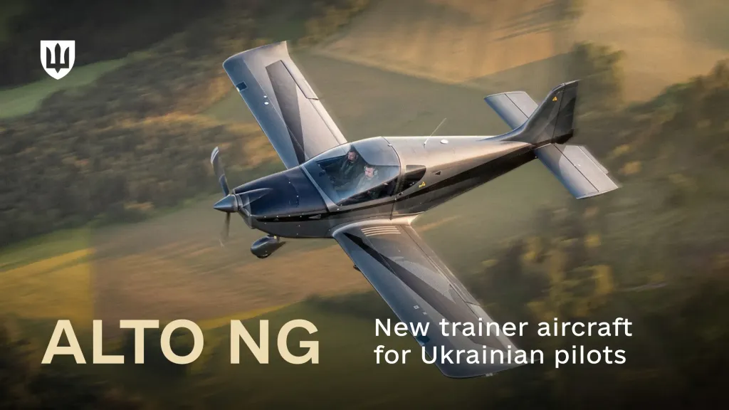 A dark grey two-seat ALTO NG light aircraft flying over fields