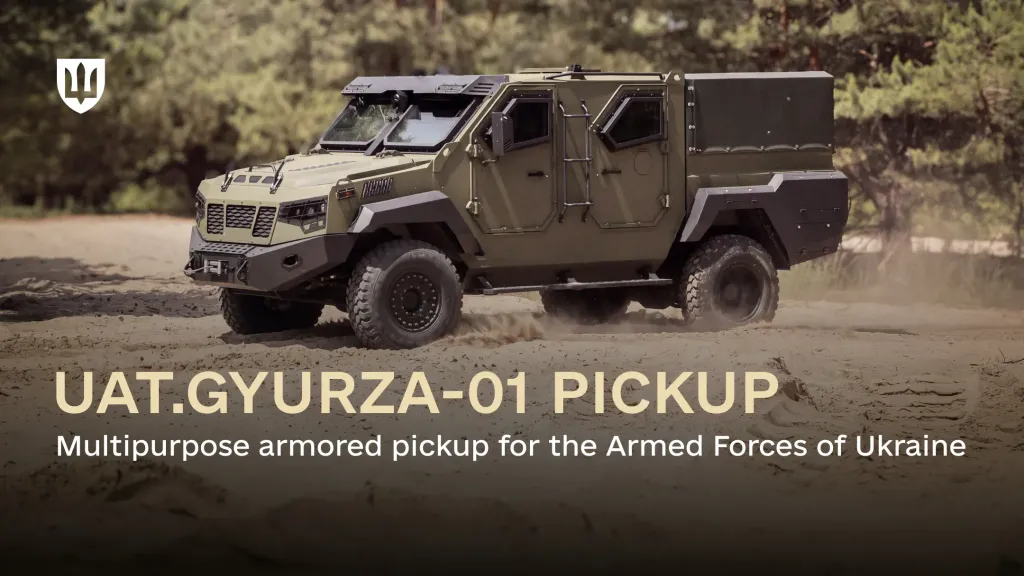 An armored UAT.GYURZA-01 PICKUP drives across sandy ground with a forest in the background