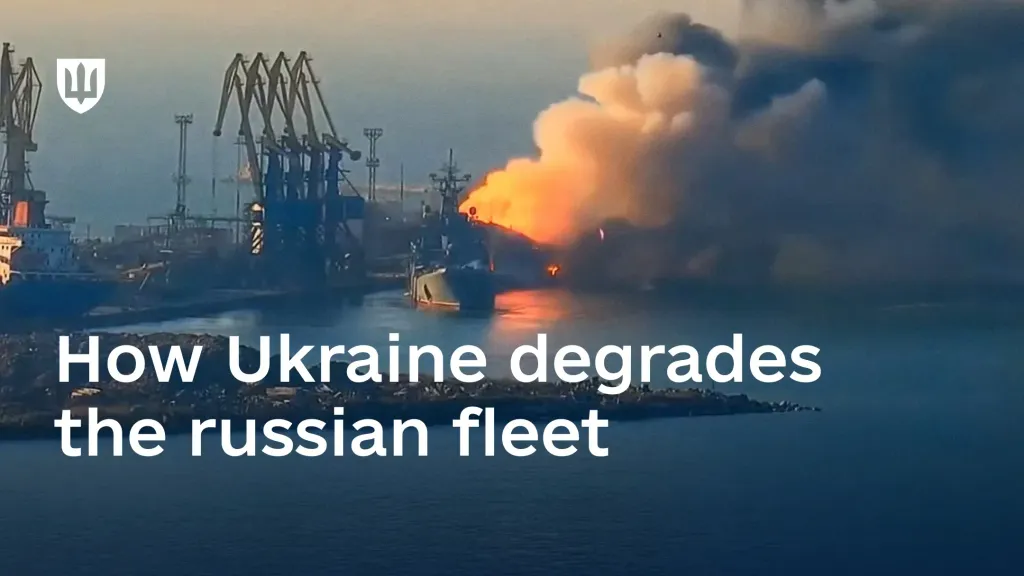 The large landing ship Saratov burns in the port of Berdiansk after a strike by the Defence Forces of Ukraine, with heavy flames and thick black smoke visible.