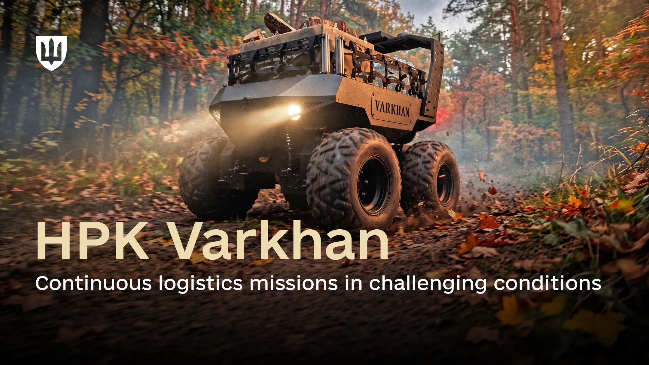 A Varkhan UGV moving along a forest road covered with yellowed leaves