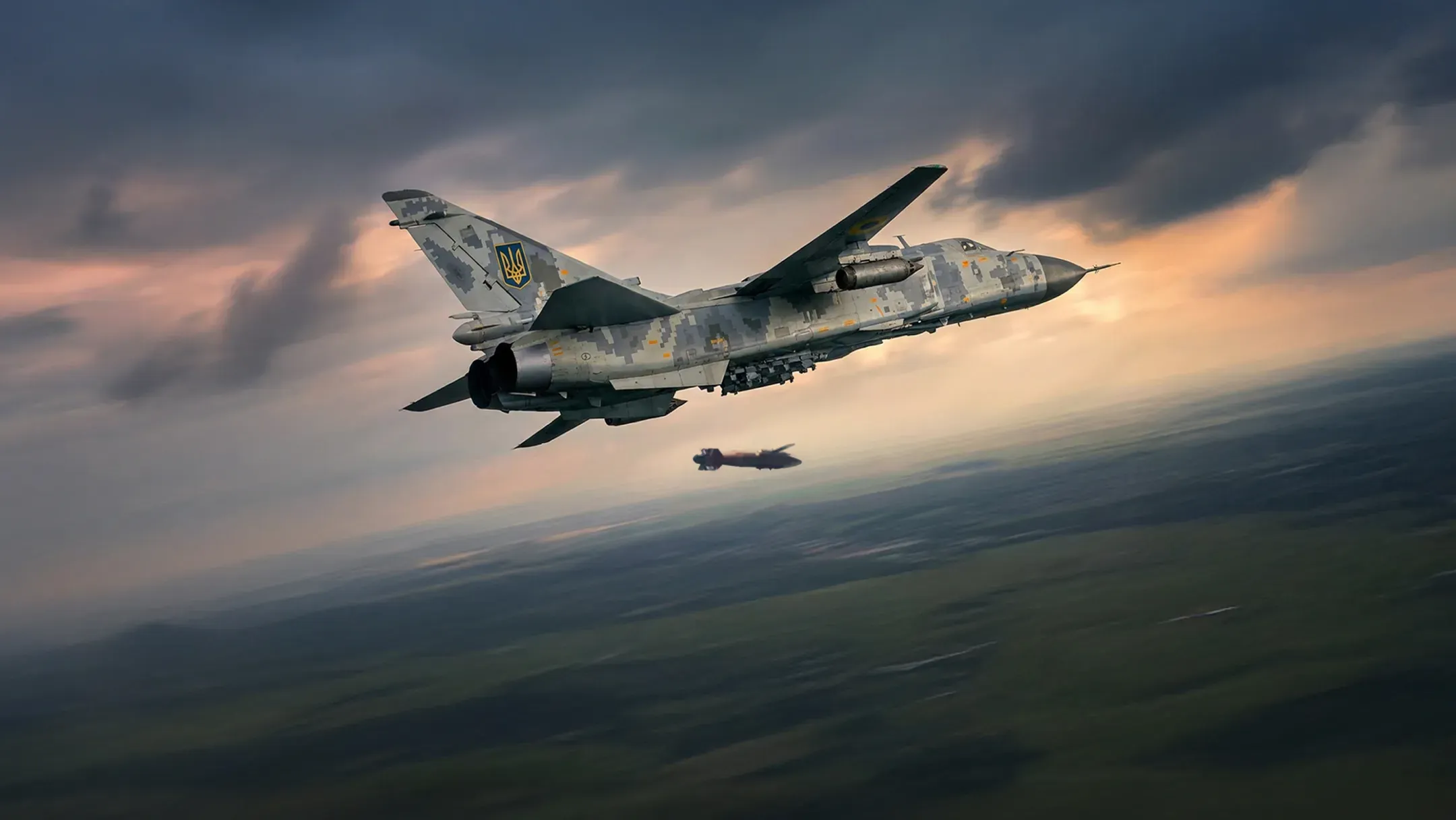 Український бомбардувальник Су-24 скидає керовану авіаційну бомбу.