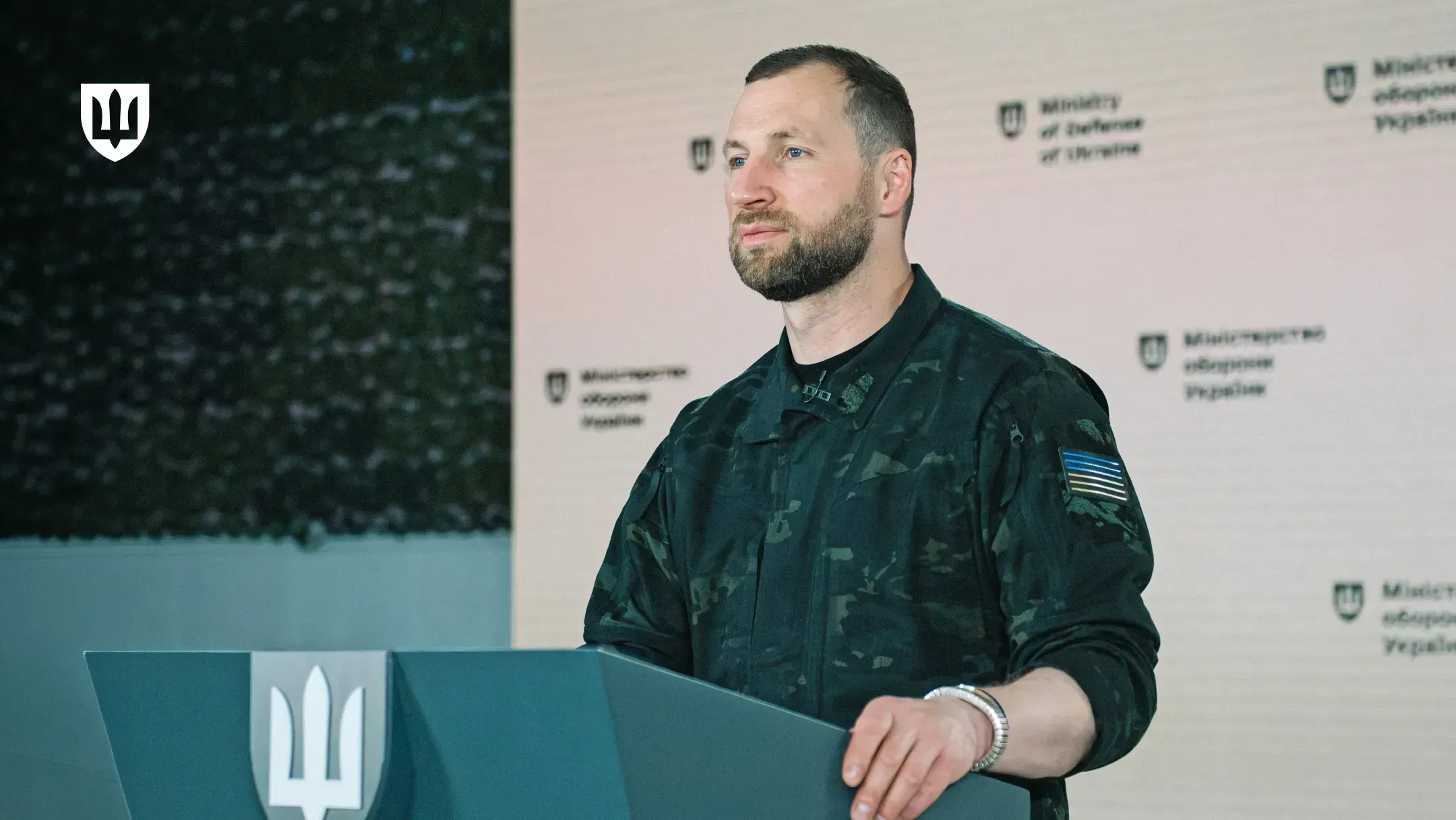 Evgeniy Khmara at a lectern