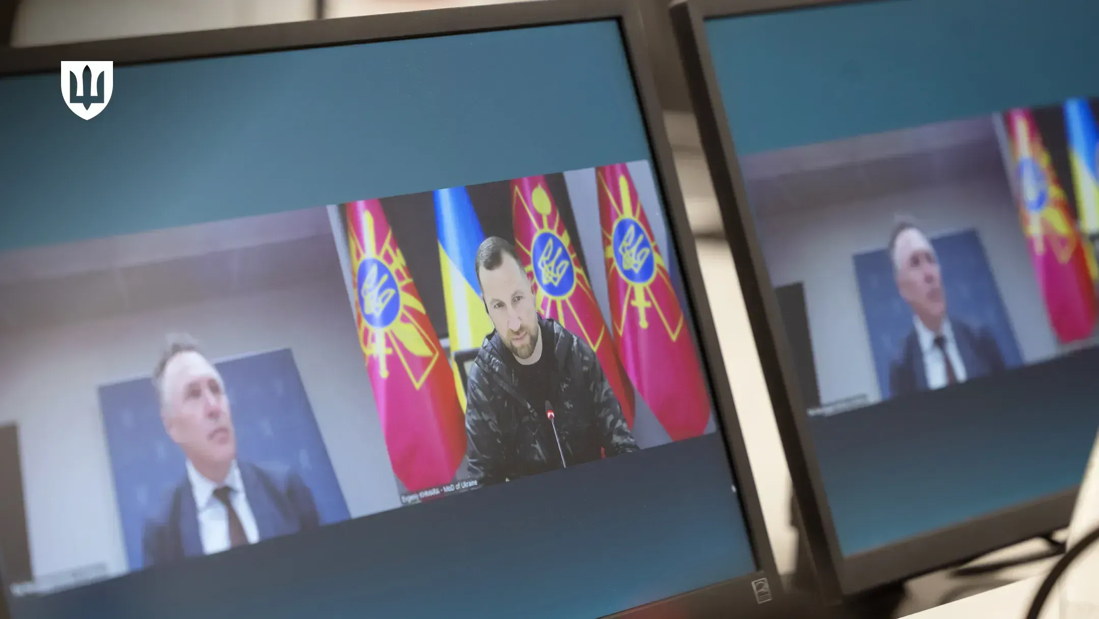 Monitors showing the video call between Tore Sandvik and Evgeniy Khmara